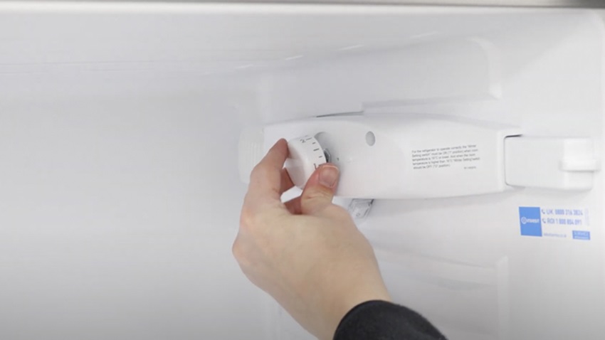 Re-attach the temperature dial to the fridge freezer